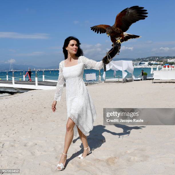 Catrinel Marlon is seen wearing Alberta Ferretti dress, bag and shoes Christian Louboutin during the 71st annual Cannes Film Festival at on May 11,...