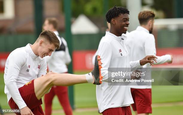 Ovie Ejaria and Ben Woodburn of Liverpool during a training session at Melwood Training Ground on May 11, 2018 in Liverpool, England.