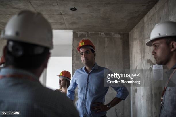 Eduardo Fischer, co-chief executive officer of MRV Engenharia e Participacoes SA, speaks to engineers at the Reserva Paulista residential complex...