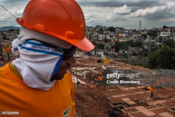 Contractors work during construction of the Reserva Paulista residential complex in Sao Paulo, Brazil, on Wednesday, March 21, 2018. The world's...