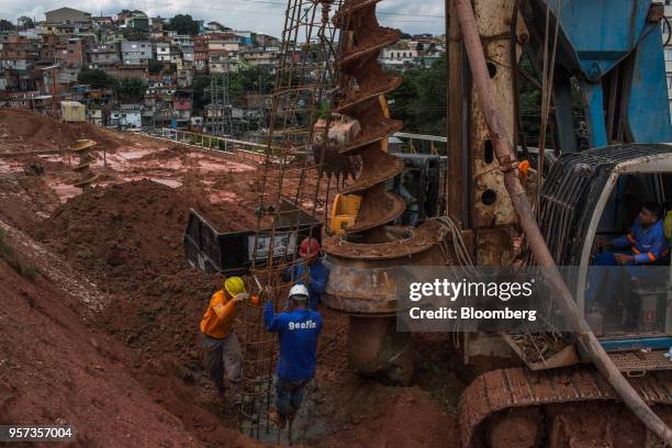 Contractors install steel reinforcement rods during construction at the Reserva Paulista residential complex in Sao Paulo, Brazil, on Wednesday,...