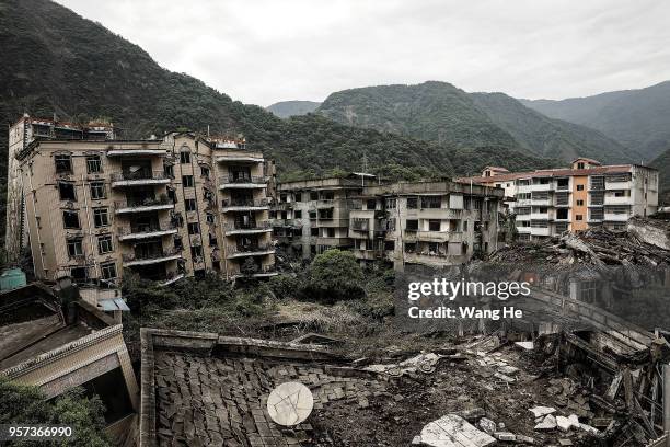 Destroyed buildings at the ruins of earthquake-hit Beichuan county during the ten year anniversary on May 11, 2018 in Beichuan Qiang Autonomous...
