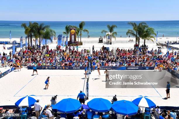 Brooke Kuhlman of Florida State University hits a kill against UCLA during the Division I Women's Beach Volleyball Championship held at Gulf Beach...