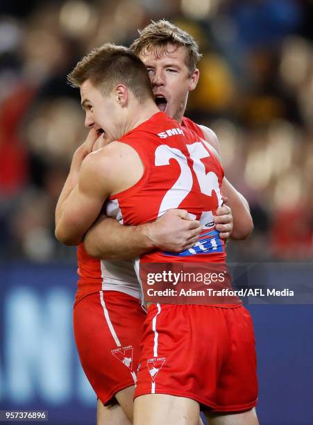 Ben Ronke of the Swans celebrates his sixth goal with Luke Parker of the Swans during the 2018 AFL round eight match between the Hawthorn Hawks and...