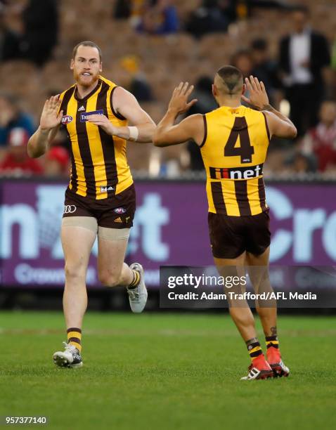 Jarryd Roughead of the Hawks celebrates a goal with Jarman Impey of the Hawks during the 2018 AFL round eight match between the Hawthorn Hawks and...