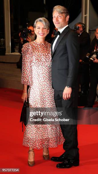 Actor Mads Mikkelsen with his wife Hanne Jacobsen attend the screening of "Arctic" during the 71st annual Cannes Film Festival at Palais des...