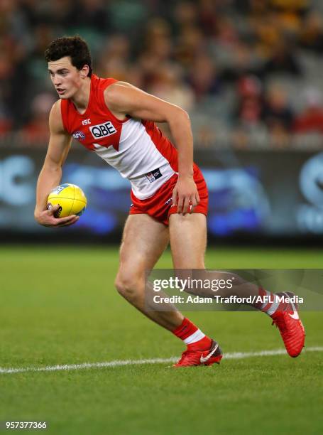 Debutant, Tom McCartin of the Swans in action during the 2018 AFL round eight match between the Hawthorn Hawks and the Sydney Swans at the Melbourne...