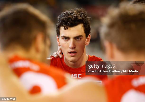 Debutant, Tom McCartin of the Swans listens in during the huddle during the 2018 AFL round eight match between the Hawthorn Hawks and the Sydney...