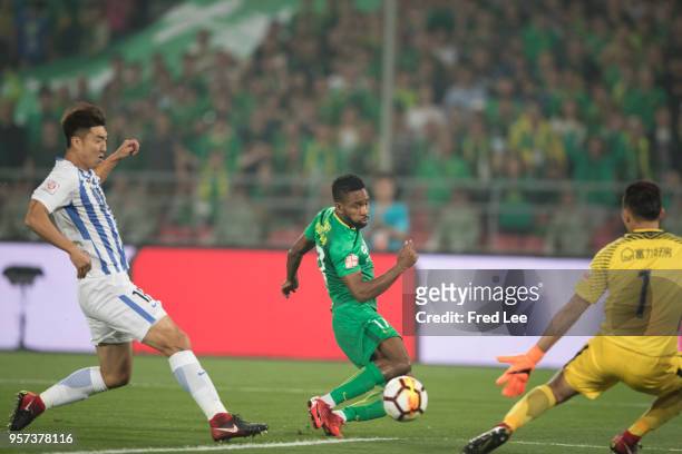 Cedric Bakambu of Beijing Guoan scores his team's goal during 2018 China Super League match between Beijing Guoan and Guangzhou R&F at Beijing...