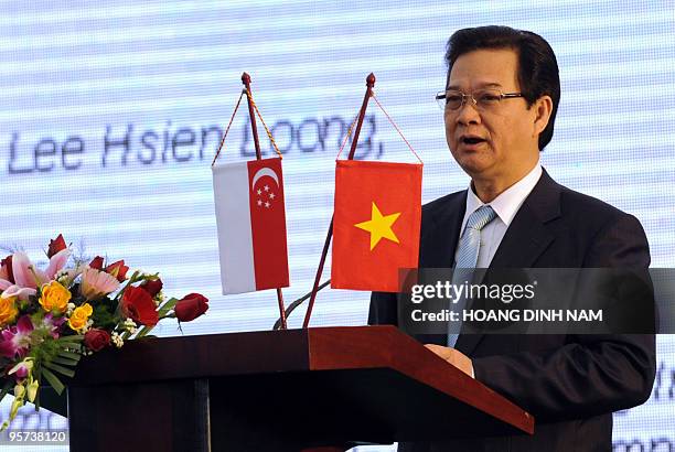 Vietnamese Prime Minister Nguyen Tan Dung makes an address in the presence of his Singaporean counterpart Lee Hsien Loong during the ground-breaking...