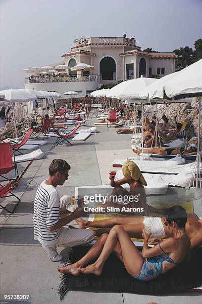 Holidaymakers at the Hotel du Cap Eden-Roc, Antibes on the French Riviera, 1969.