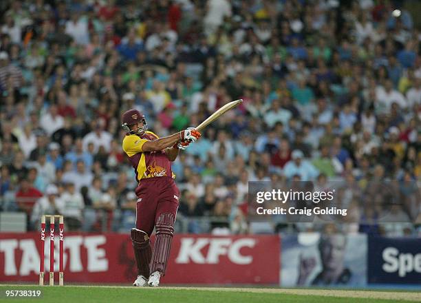 Andrew Symonds of the Bulls bats during the Twenty20 Big Bash match between the New South Wales Blues and the Queensland Bulls at ANZ Stadium on...