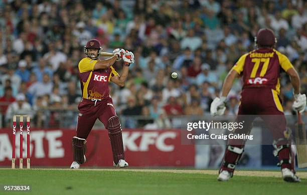 Andrew Symonds of the Bulls bats during the Twenty20 Big Bash match between the New South Wales Blues and the Queensland Bulls at ANZ Stadium on...