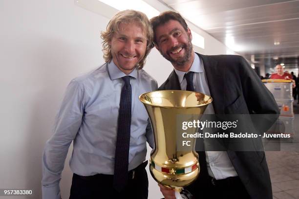 Pavel Nedved and Andrea Agnelli of Juventus in action during the TIM Cup Final between Juventus and AC Milan at Stadio Olimpico on May 9, 2018 in...