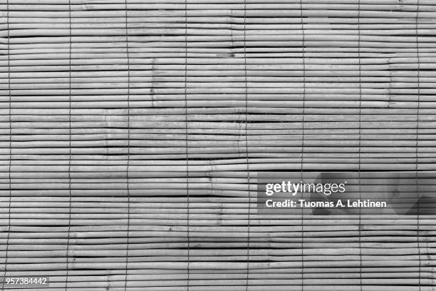 full frame background of aged wooden bamboo blinds, popular in asia, in black and white - black bamboo stock pictures, royalty-free photos & images