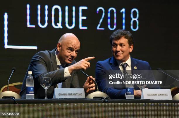 President Gianni Infantino and the re-elected President of the South American Football Confederation Alejandro Dominguez, are pictured during the...