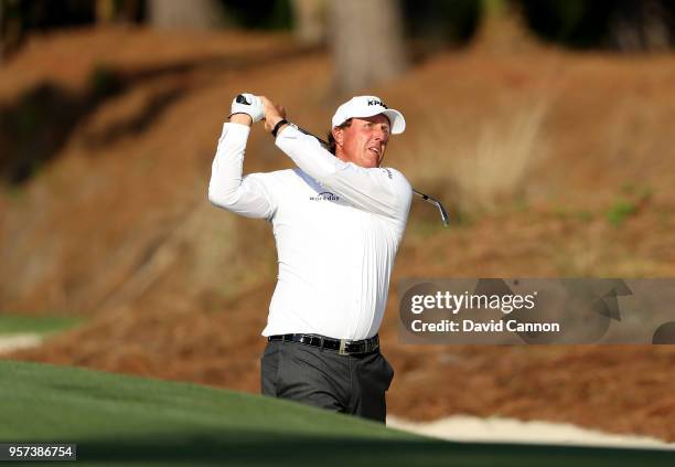 Phil Mickelson of the United States plays his second shot on the par 4, 10th hole during the second round of the THE PLAYERS Championship on the...