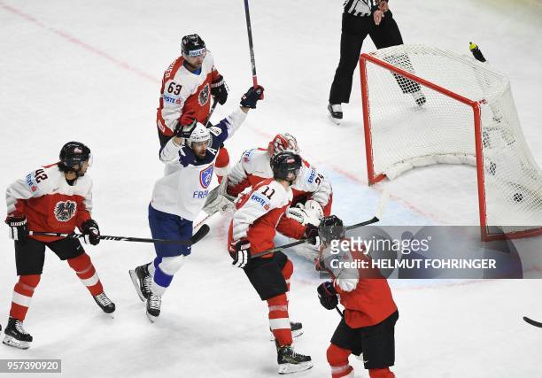 France's Damien Fleury celebrates scoring during the group A match France vs Austria of the 2018 IIHF Ice Hockey World Championship at the Royal...