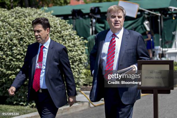 Dietmar Exler, president and chief executive officer of Mercedes-Benz USA LLC, left, and Bob Carter, executive vice president of sales with Toyota...