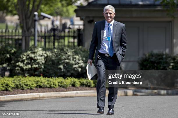 Rick Schostek, executive vice president of Honda North America Inc., arrives for a meeting with U.S. President Donald Trump, not pictured, at the...