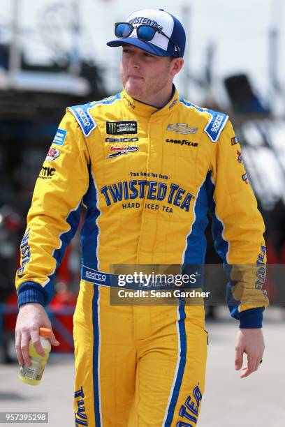 Ty Dillon, driver of the Twisted Tea Chevrolet, walks in the garage during practice for the Monster Energy NASCAR Cup Series KC Masterpiece 400 at...