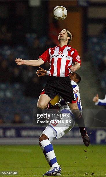 Sheffield United's Dutch defender Marcel Seip vies with Queens Park Rangers' Antiguan midfielder Mikele Leigertwood during their FA Cup third round...