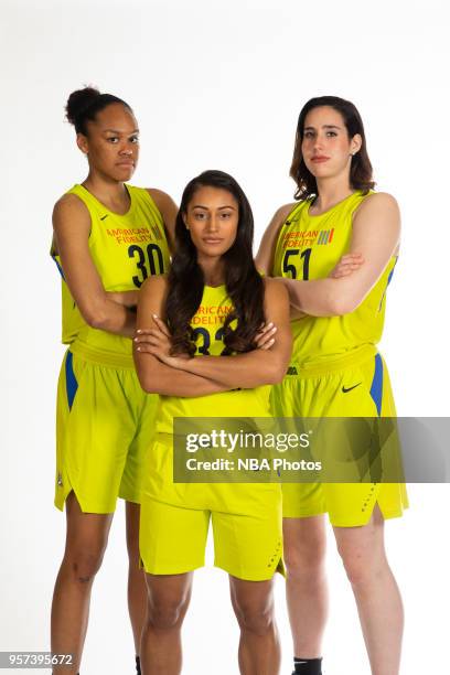 Azura Stevens, Loryn Goodwin, and Natalie Butler of the Dallas Wings pose for a portrait during Dallas Wings Media Day at Bankers Life Fieldhouse on...