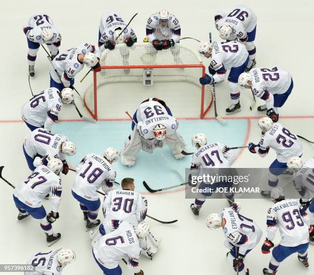 Players of Norway take a moment around their goalkeeper Henrik Haukeland before the group B match Denmark vs Norway of the 2018 IIHF Ice Hockey World...