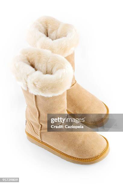 pêlo de carneiro botas - sheepskin boot imagens e fotografias de stock