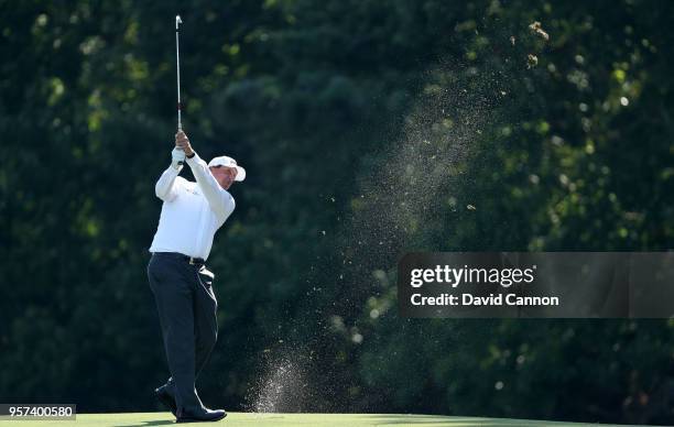 Phil Mickelson of the United States plays his second shot on the par 4, 14th hole during the second round of the THE PLAYERS Championship on the...