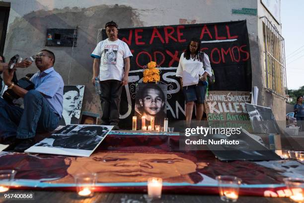 Demonstrators gather in Nogales, Sonora, Mexico at a vigil on May 10, 2018 for Jose Antonio Elena Rodriguez, the Mexican teenager who was shot and...