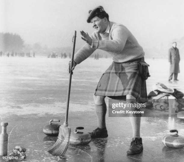 Blair McNaughton taking part in a curling 'Grand Match' of the Royal Caledonian Curling Club on Loch Leven, Kinross, Scotland, 28th January 1959.