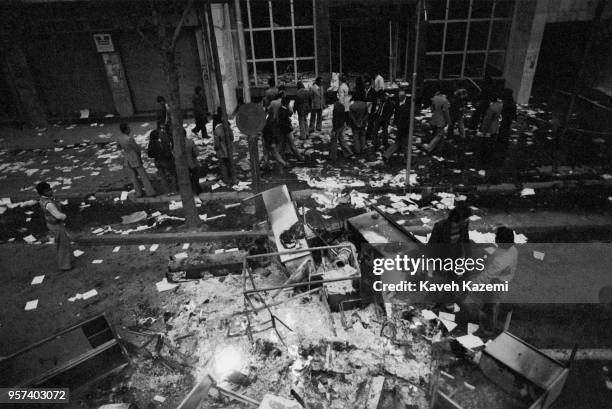The aftermath of a day of rioting and looting at dusk in Tehran during the Iranian Revolution, 4th November 1978. Protestors took to the streets,...