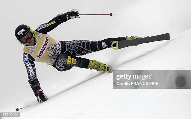 Jake Zamansky of the US clears a gate during the men's giant slalom event at the FIS Alpine Skiing World Cup on January 9, 2010 in Adelboden. The...