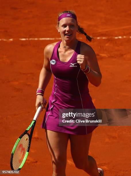 Kiki Bertens of the Netherlands celebrates match point against Caroline Garcia of France in their semi final match during day seven of the Mutua...