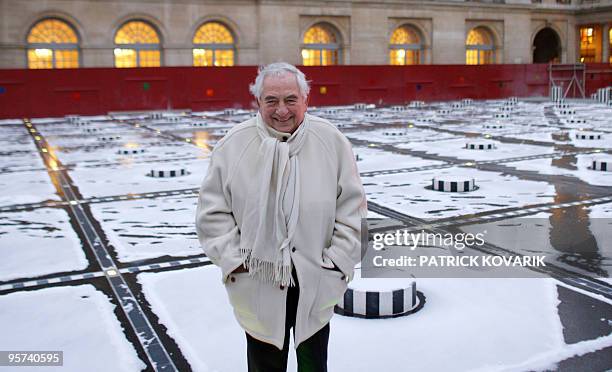 French artist Daniel Buren poses on January 8, 2010 at the Palais Royal in Paris, before the official unveiling of the renovated Buren's striped...