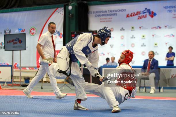 Hakan Recber of the Turkey in action against Deni Andrun of Croatia in their final bout of the men's 63 kg category match of the WTE European...