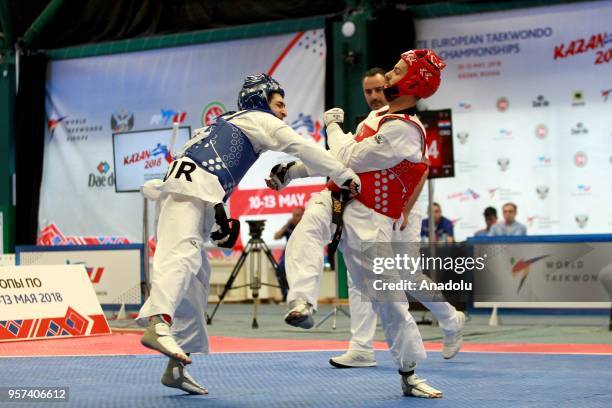 Hakan Recber of the Turkey in action against Deni Andrun of Croatia in their final bout of the men's 63 kg category match of the WTE European...