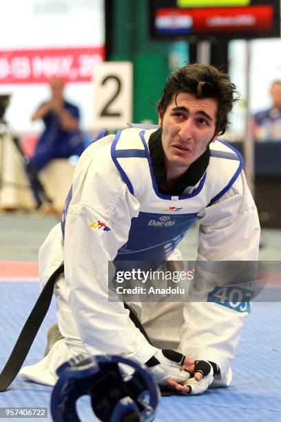 Hakan Recber of the Turkey get upset after competing against Deni Andrun of Croatia in their final bout of the men's 63 kg category match of the WTE...