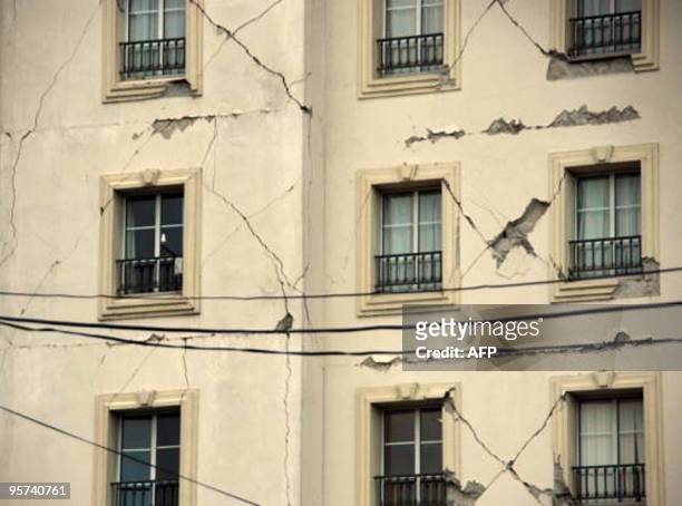 Damage to a building is seen on January 12, 2010 in Port-au-Prince after a huge quake measuring 7.0 rocked the impoverished Caribbean nation of...