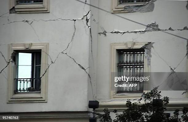 Damage to a building is seen on January 12, 2010 in Port-au-Prince after a huge quake measuring 7.0 rocked the impoverished Caribbean nation of...