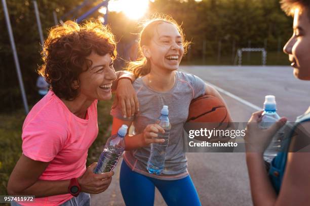 after training - teenage girl basketball stock pictures, royalty-free photos & images