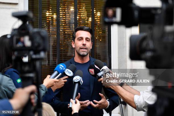 General coordinator of the Brazil national football team Edu Gaspar answers journalists' questions after Brazilian defender Dani Alves was ruled out...