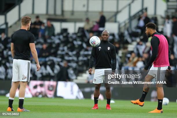 Neeskens Kebano of Fulham and Cyrus Christie of Fulham during the Sky Bet Championship Play Off Semi Final:First Leg match between Derby County and...