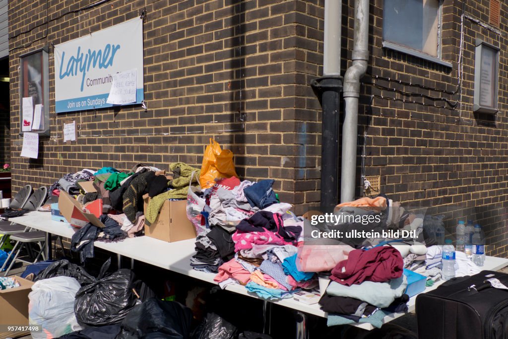 Fire brigade and community groups helping with fire disaster at  of Grenfell Tower in West London,UK. 14th June 2017.