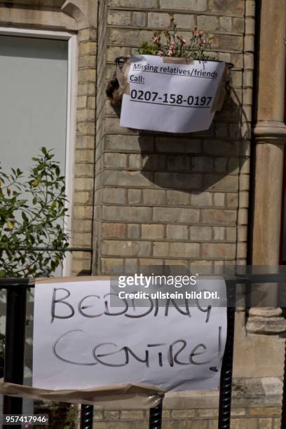 London,UK. 14th June 2017..Signs with tips on practical issues next to Grenfell Tower,London,UK.London,UK. 14th June 2017.© Julio Etchart/Alamy Live...