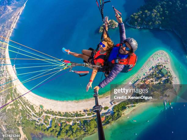 paragliding - ölüdeniz stock pictures, royalty-free photos & images