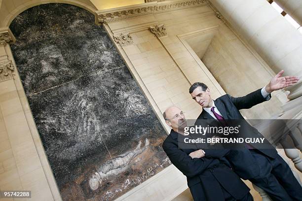 German artist Anselm Kiefer chats with Louvre museum's director Henri Loyrette, 24 October 2007 at the Louvre museum in Paris, during the...