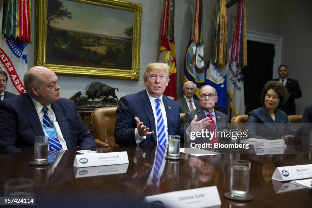 President Donald Trump, center, speaks while Jim Hackett, president and chief executive officer of Ford Motor Co., from left, Larry Kudlow, director...