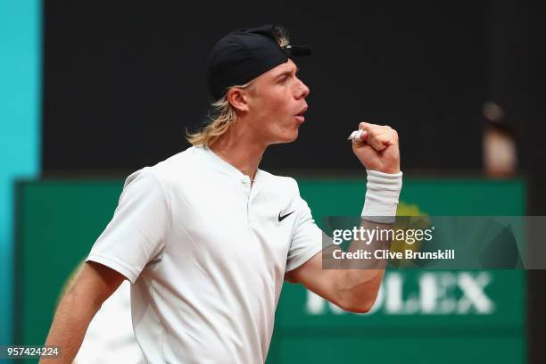 Denis Shapvalov of Canada celebrates in his singles match against Kyle Edmund of Great Britain during day seven of Mutua Madrid Open at La Caja...